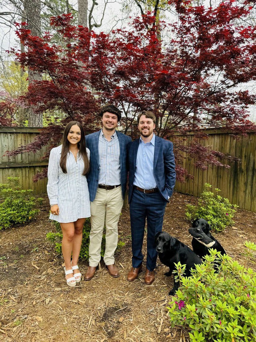 Payton with family outdoors